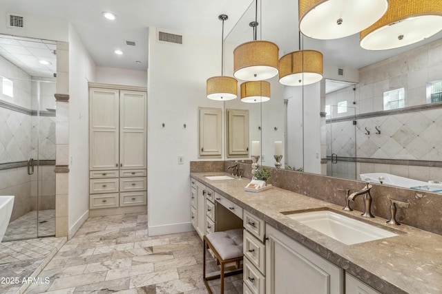 bathroom featuring walk in shower and vanity