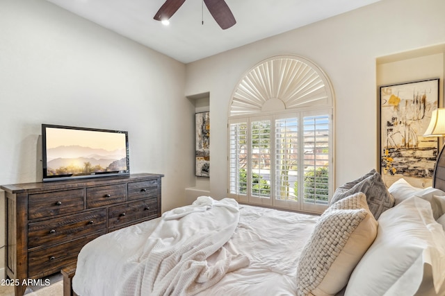 bedroom featuring access to exterior and ceiling fan