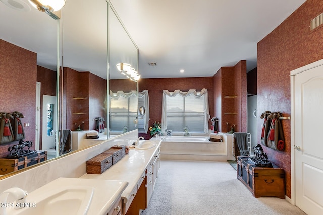 bathroom featuring a bathing tub and vanity