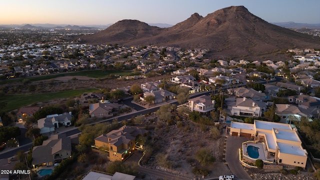 aerial view at dusk with a mountain view