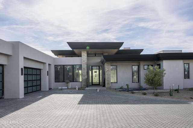 modern home featuring a garage