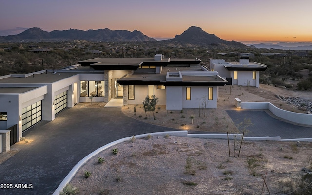 28805 N 114th St, Scottsdale, AZ 85262 - view of front of home featuring a garage, driveway, a mountain view, and stucco siding
