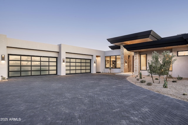 28805 N 114th St, Scottsdale, AZ 85262 - contemporary house with a garage, decorative driveway, and stucco siding