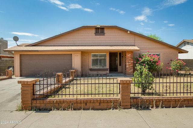 view of front of home with a garage