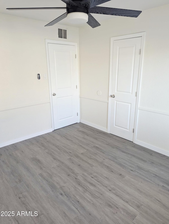 3421 W Montecito Ave, Phoenix, AZ 85017 - unfurnished bedroom with wood finished floors and ceiling fan