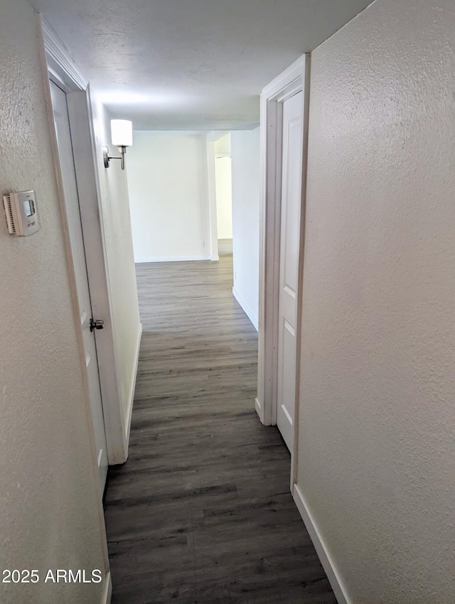 3421 W Montecito Ave, Phoenix, AZ 85017 - hallway featuring wood finished floors and a textured wall
