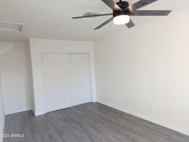 3421 W Montecito Ave, Phoenix, AZ 85017 - unfurnished bedroom featuring wood finished floors, attic access, a closet, and ceiling fan