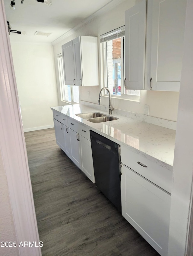 3421 W Montecito Ave, Phoenix, AZ 85017 - kitchen with dishwashing machine, dark wood-type flooring, white cabinetry, and light stone counters