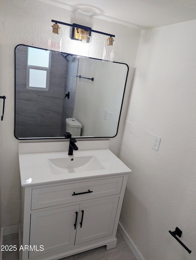 3421 W Montecito Ave, Phoenix, AZ 85017 - bathroom with vanity and marble look tiles