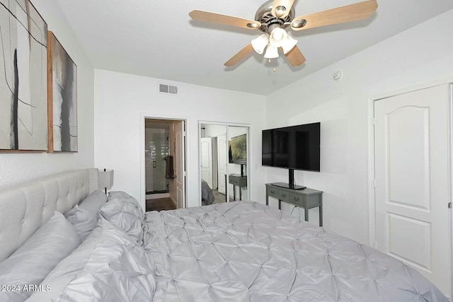 bedroom featuring ceiling fan and connected bathroom