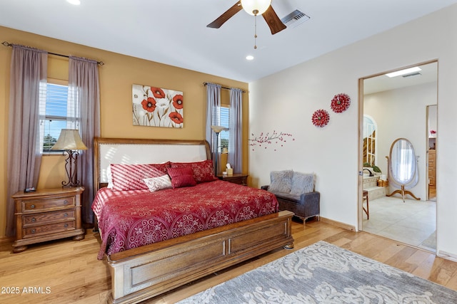 bedroom featuring ceiling fan and light wood-type flooring