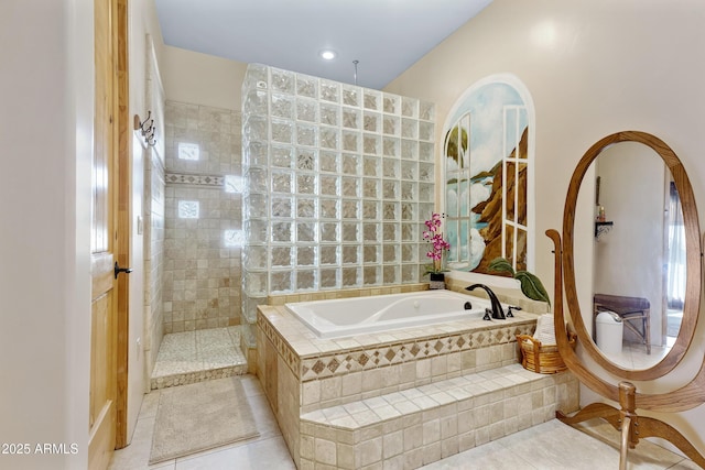 bathroom featuring separate shower and tub and tile patterned floors