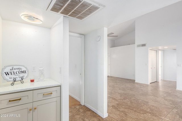 interior space featuring vaulted ceiling