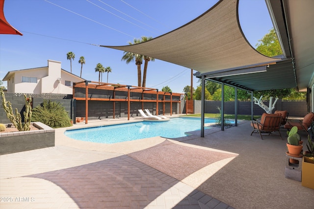 8502 E Rose Ln, Scottsdale, AZ 85250 - view of swimming pool with a patio area and a fenced backyard