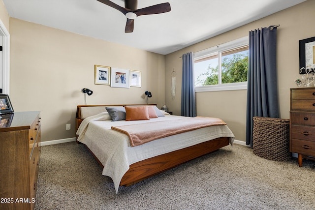 8502 E Rose Ln, Scottsdale, AZ 85250 - carpeted bedroom featuring baseboards and a ceiling fan