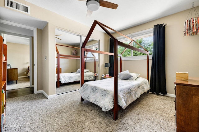 8502 E Rose Ln, Scottsdale, AZ 85250 - carpeted bedroom featuring baseboards and ceiling fan