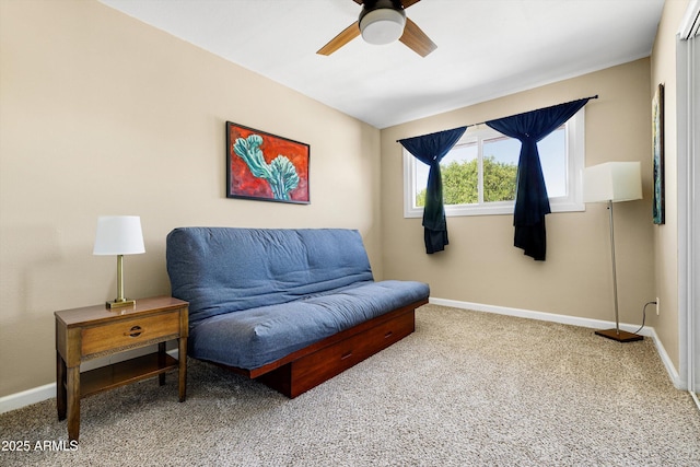 8502 E Rose Ln, Scottsdale, AZ 85250 - living area featuring a ceiling fan, baseboards, and carpet floors