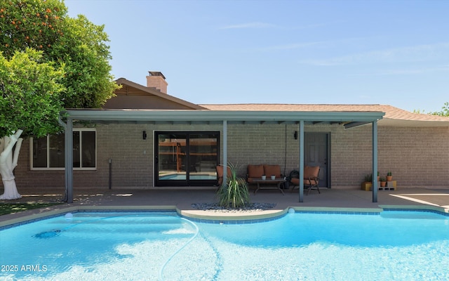 8502 E Rose Ln, Scottsdale, AZ 85250 - outdoor pool with outdoor lounge area and a patio