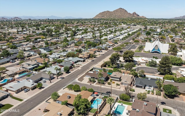8502 E Rose Ln, Scottsdale, AZ 85250 - aerial view of residential area with a mountainous background and a pool