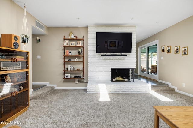 8502 E Rose Ln, Scottsdale, AZ 85250 - living area with carpet floors, a fireplace, and baseboards
