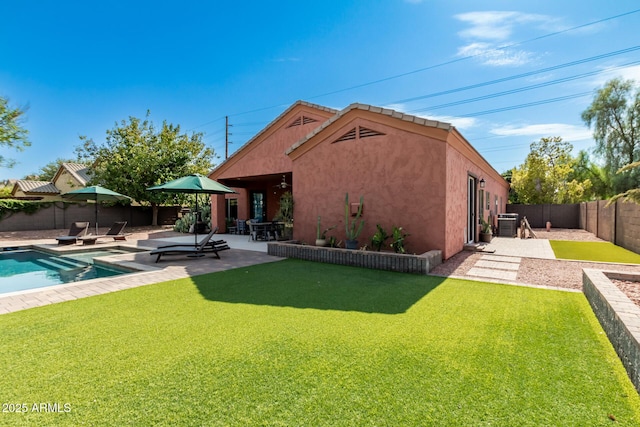 6719 N 15th Ave, Phoenix, AZ 85015 - rear view of property with stucco siding, a patio, and central AC unit