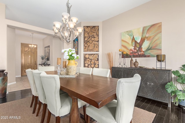 6719 N 15th Ave, Phoenix, AZ 85015 - dining room featuring a chandelier and wood finished floors