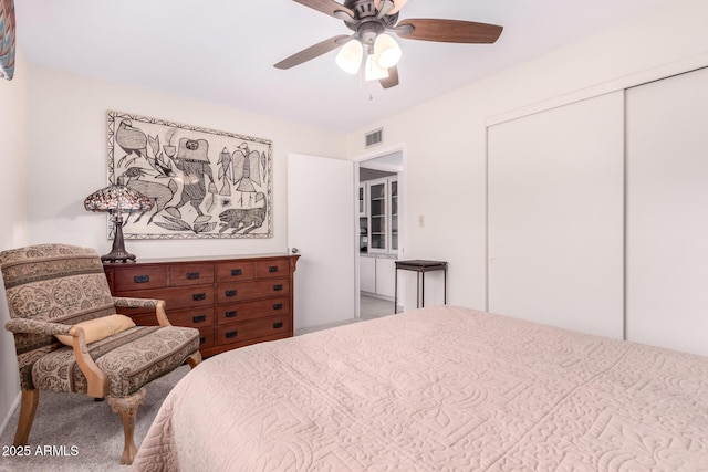bedroom featuring a closet and ceiling fan