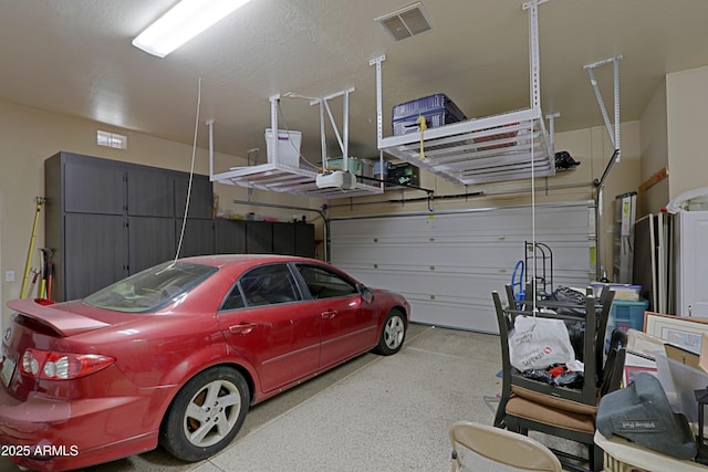 32516 N 68th Pl, Scottsdale, AZ 85266 - garage featuring a garage door opener