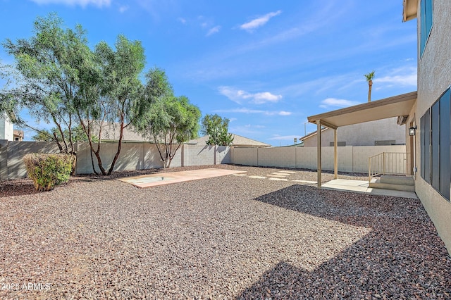 view of yard featuring a patio area