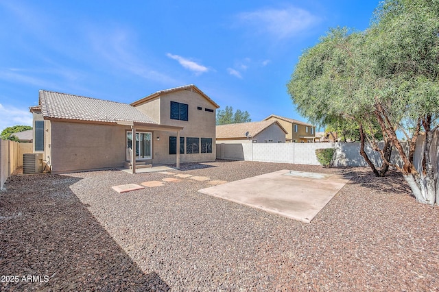 rear view of property with a patio area