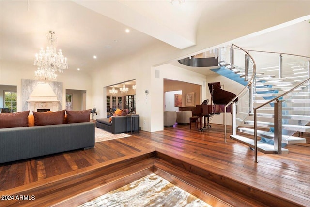 living room featuring hardwood / wood-style flooring and a notable chandelier