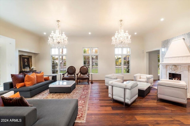 living room with a premium fireplace and dark wood-type flooring