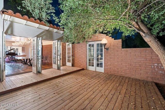 wooden deck featuring french doors