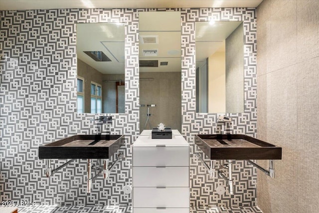 bathroom with tile walls