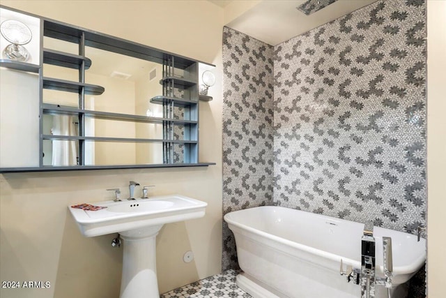 bathroom featuring a washtub