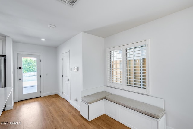 2336 E Flower St, Phoenix, AZ 85016 - mudroom with light wood finished floors, baseboards, and recessed lighting