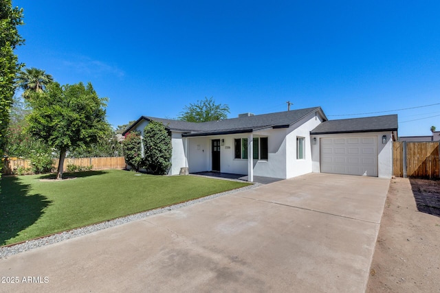 2336 E Flower St, Phoenix, AZ 85016 - single story home with stucco siding, an attached garage, concrete driveway, and a shingled roof