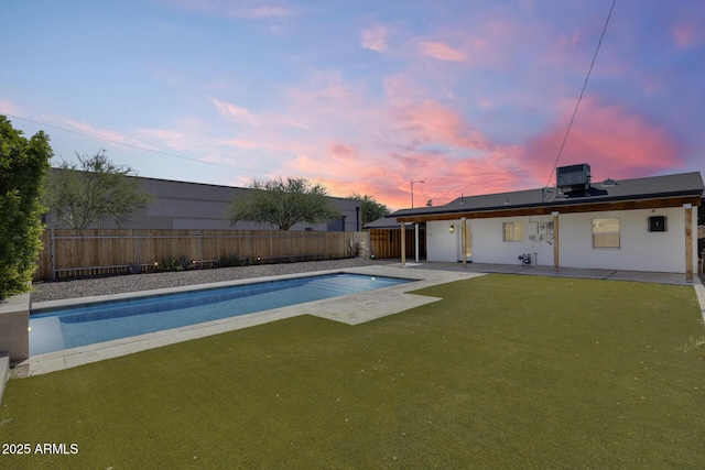 2336 E Flower St, Phoenix, AZ 85016 - pool at dusk with a patio area