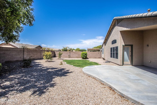 view of yard with a patio area