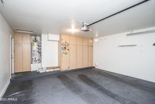3127 W Folgers Rd, Phoenix, AZ 85027 - garage with gas water heater, a garage door opener, and baseboards