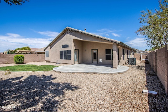 3127 W Folgers Rd, Phoenix, AZ 85027 - back of property featuring stucco siding, cooling unit, a patio, and a fenced backyard