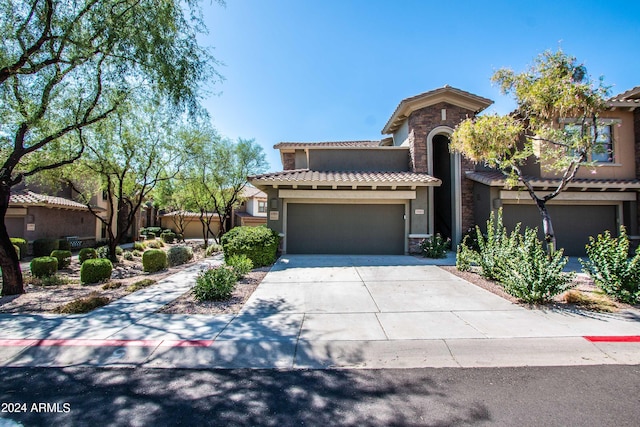 view of front of property featuring a garage