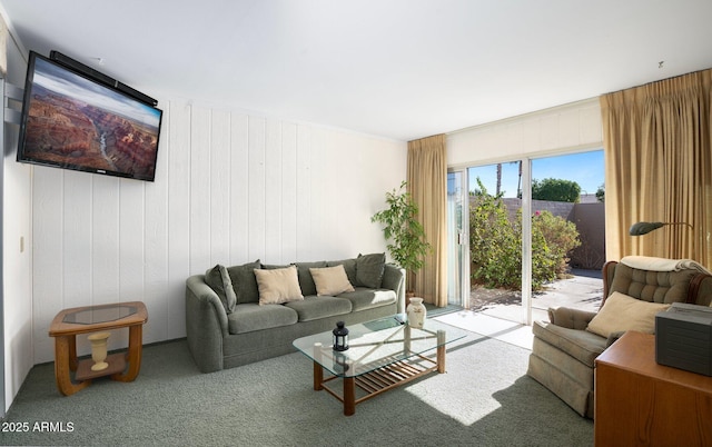 living room featuring light carpet