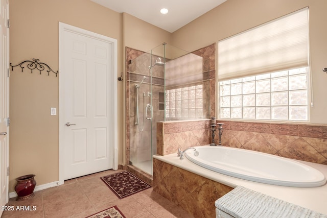 bathroom featuring shower with separate bathtub and tile patterned floors