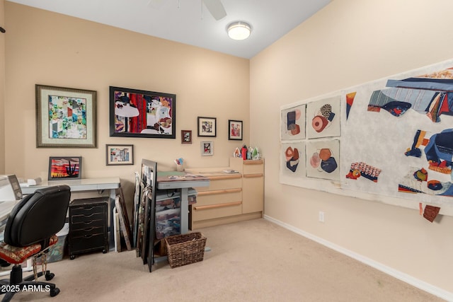 office area with baseboards, carpet, and ceiling fan