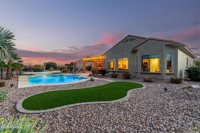 view of pool with a fenced in pool and a patio area