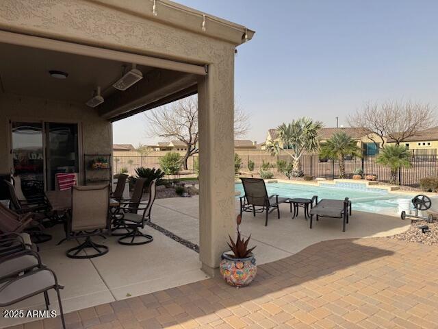 view of patio with a fenced backyard and a fenced in pool