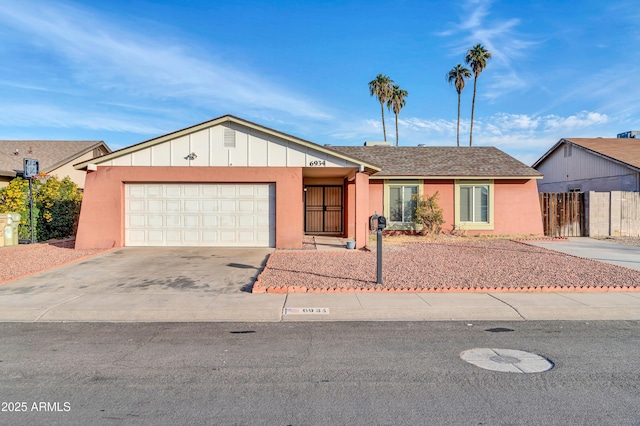 ranch-style house featuring a garage