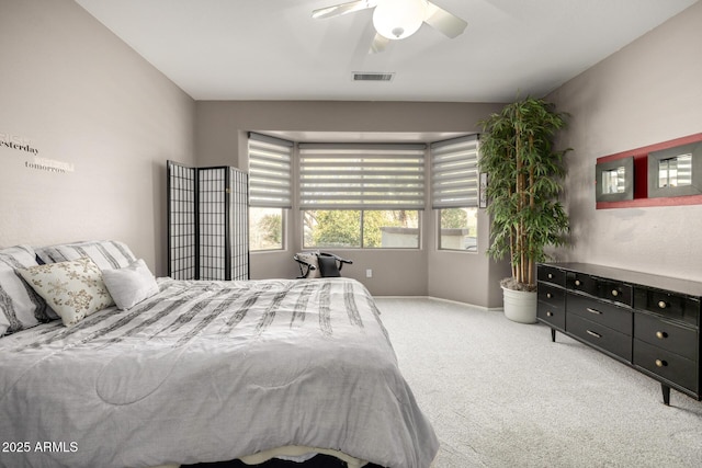 bedroom featuring ceiling fan and light colored carpet