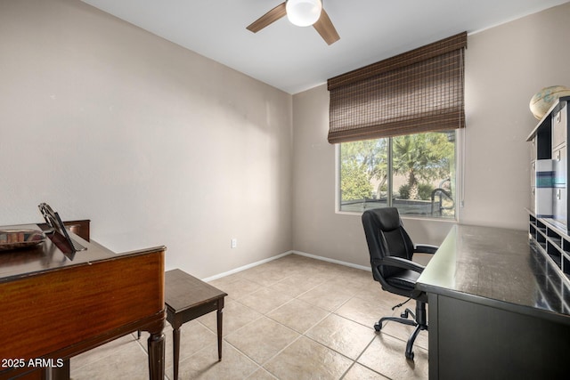 office area with ceiling fan and light tile patterned floors